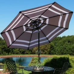 Sunnydaze Decor Sunnydaze Outdoor Pool Patio Umbrella with Solar LED Lights, Tilt, and Crank - 9' - Navy Blue Stripe -Deals Patio Umbrellas Store unnamed file 2137