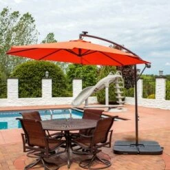 Sunnydaze Decor Sunnydaze Outdoor Steel Solar Offset Cantilever Patio Umbrella with Crank and Base - 10' - Burnt Orange