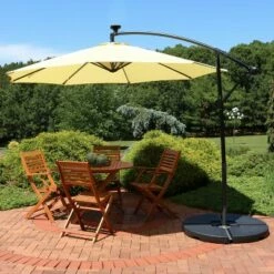 Sunnydaze Decor Sunnydaze Outdoor Steel Cantilever Offset Patio Umbrella with Solar LED Lights, Air Vent, Crank, and Base - 9' - Pale Buttercup