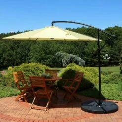 Sunnydaze Decor Sunnydaze Outdoor Steel Cantilever Offset Patio Umbrella with Air Vent, Crank, and Base - 9' - Pale Buttercup