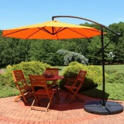 Sunnydaze Decor Sunnydaze Outdoor Steel Cantilever Offset Patio Umbrella with Air Vent, Crank, and Base - 9' - Tangerine